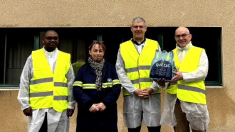Monseigneur Pelletier visite Quézac : patrimoine religieux et usine d'embouteillage en Lozère