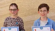 Mila et Aurel brillent au concours des Petits Champions de la lecture