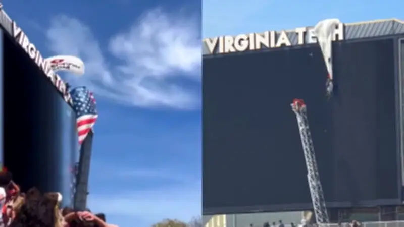 Parachutiste suspendu au tableau des scores lors d'un match aux États-Unis